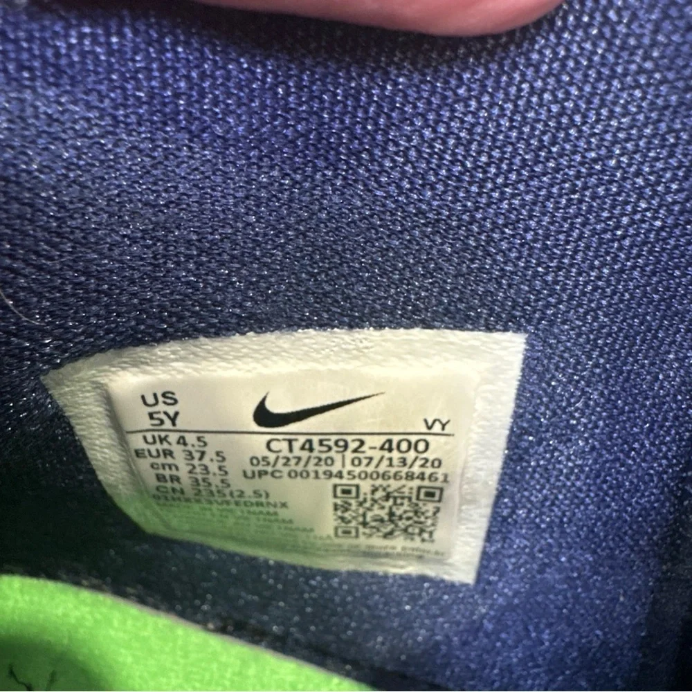 Nike Kids Navy Sneakers with Pink and Yellow Accents